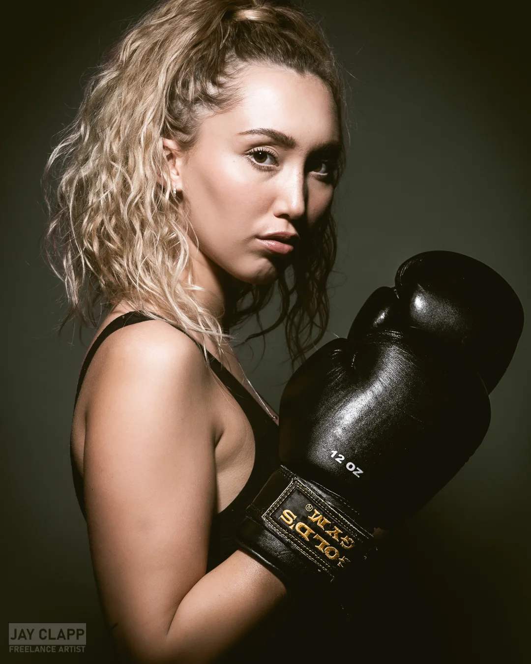 Boxing glove portrait woman