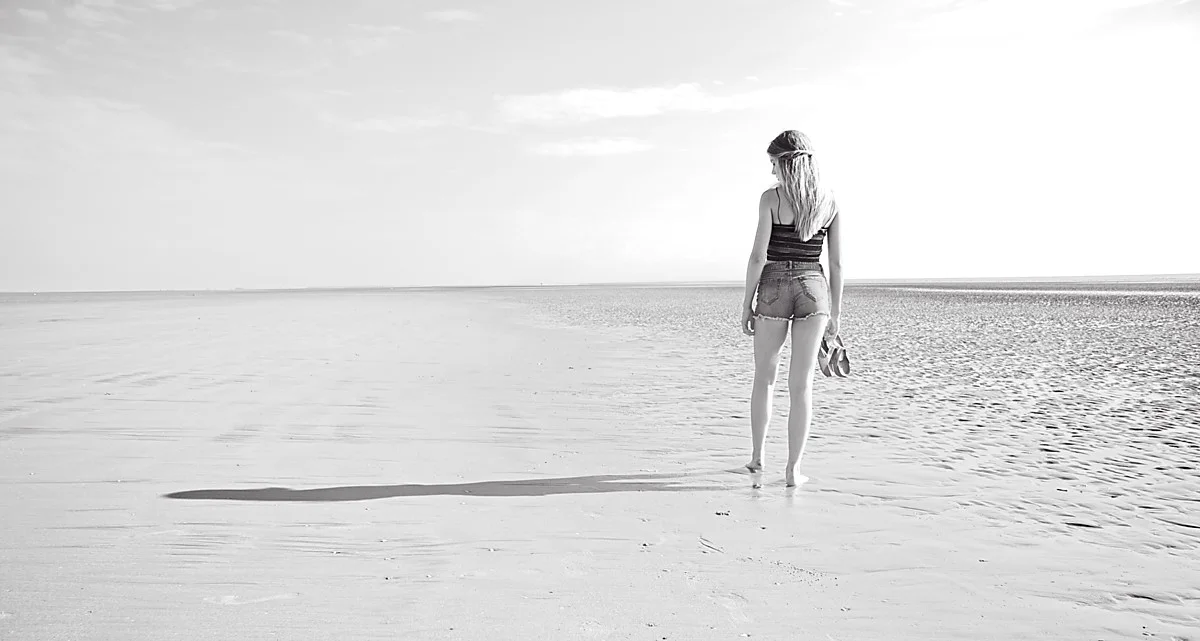 Minimalist beach portrait black and white