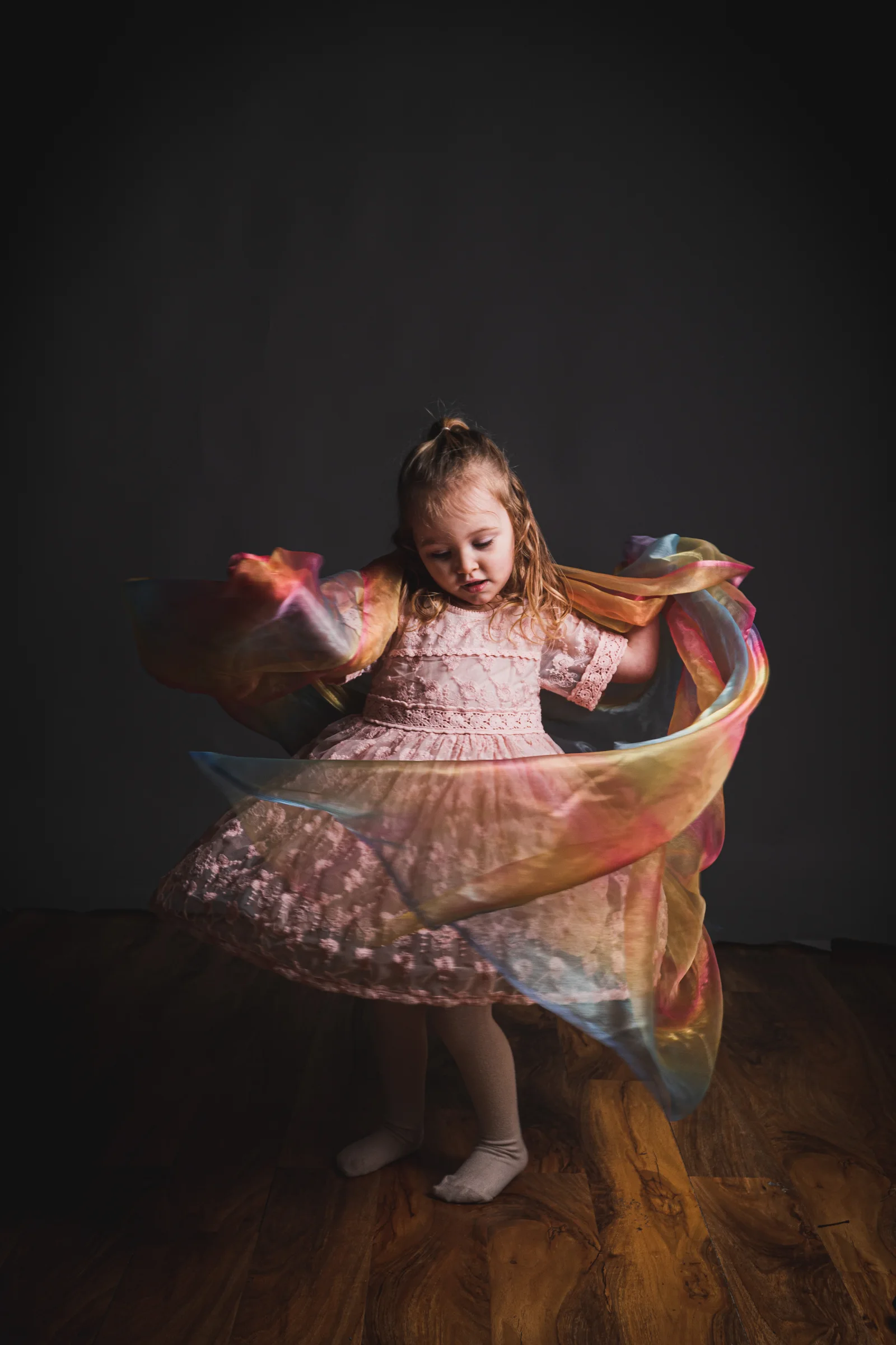 Playful child portrait colourful dress