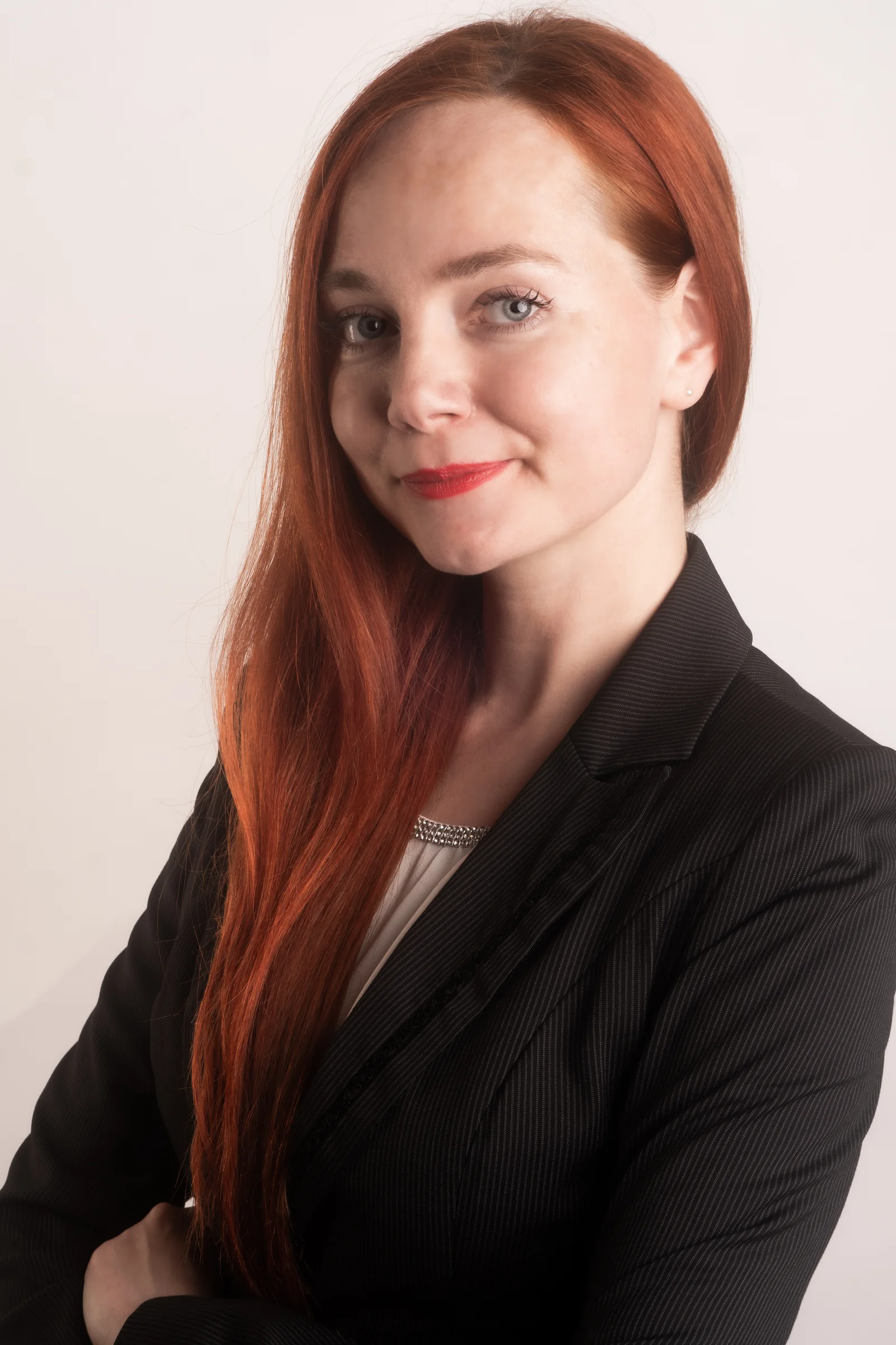 Professional red haired head and shoulders portrait