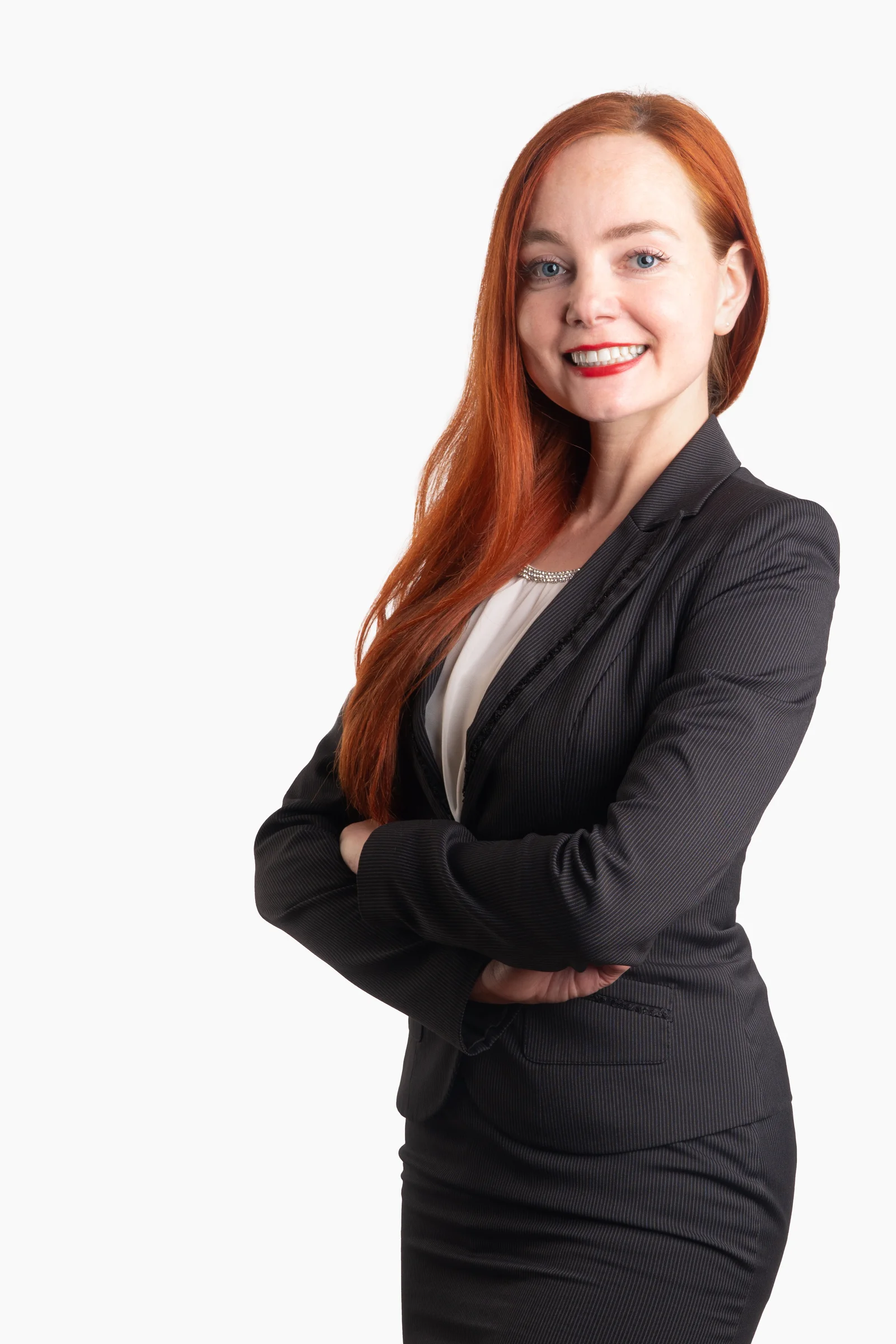 Professional red haired woman black suit