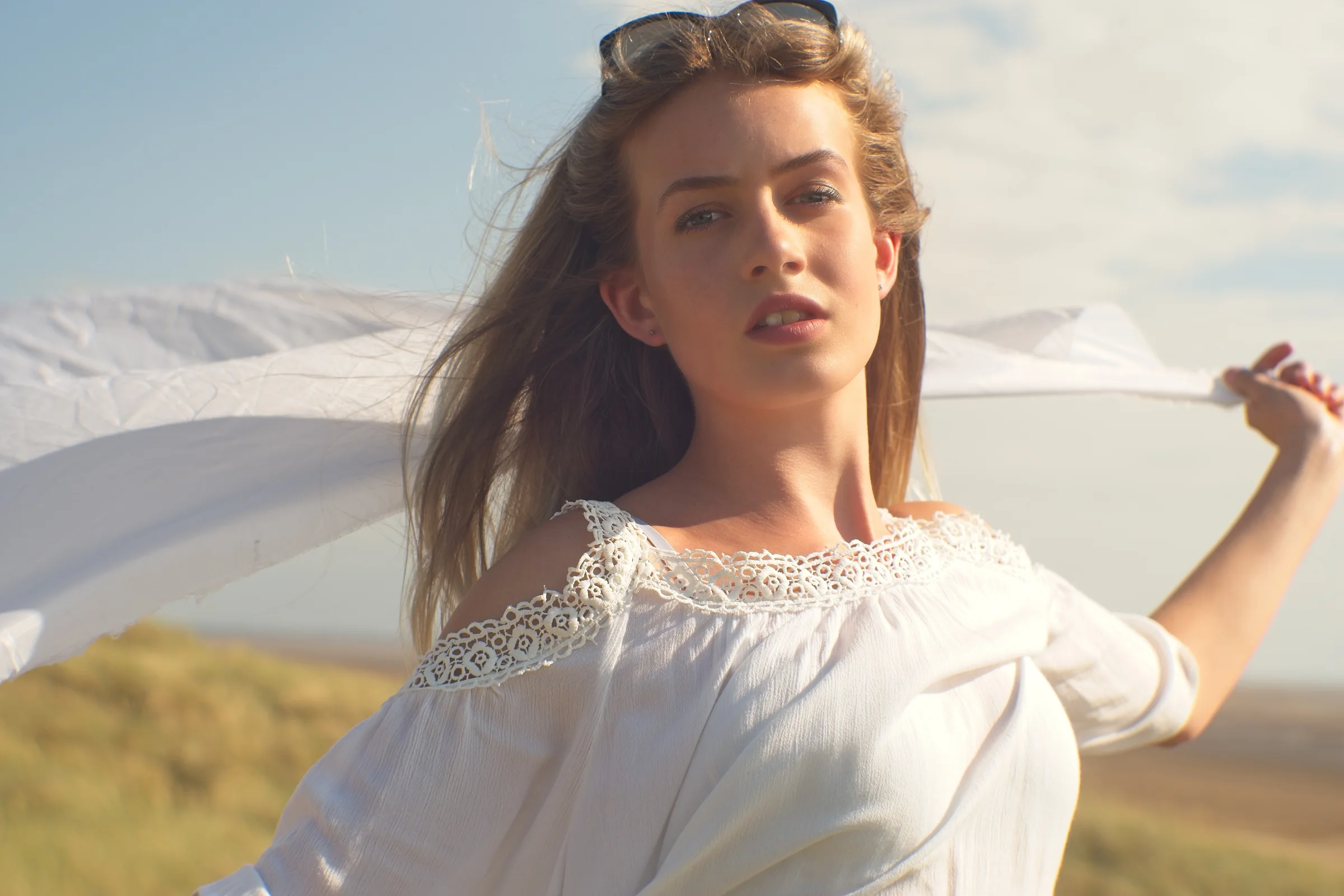 Sunlit outdoor portrait white blouse